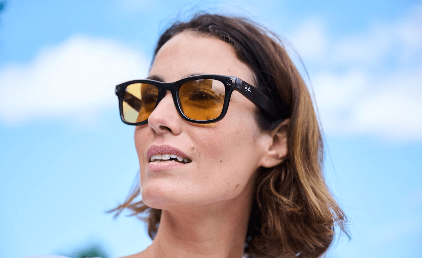 a girl enjoying the social media focused meta Ray-Ban partnership glasses